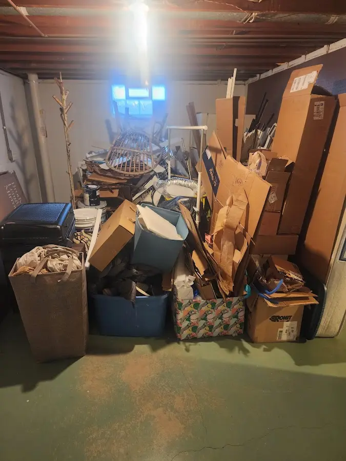 Roll-off dumpster container at job site for Cleanout Dumpster Rental in Newport